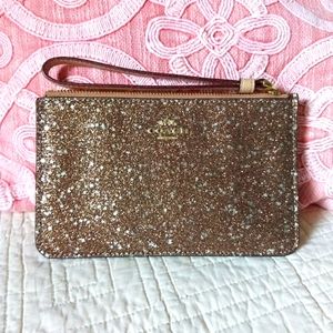 Like new Designer Coach Corner Zip Wristlet - Rose Gold Glitter w/Stars F22705